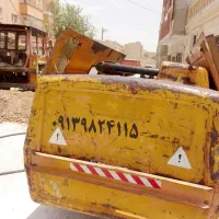 بیل بکهو کمپرسور کاترآسفالت بر پیکور بالابر تخریب
