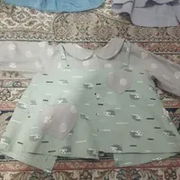 لباس بچه|کفش و لباس بچه|مراغه, |دیوار