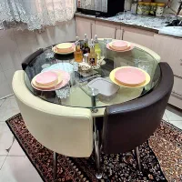 میز ناهار خوری 4نفره کمجا 2طبقه چرم پایه فلز چرخان