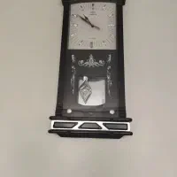 میز تلویزیون و ساعت