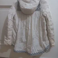 کاپشن خارجی|لباس|تهران, تسلیحات|دیوار