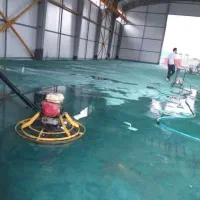 بتن ریزی با ماله پروانه ای وتراز لیزری