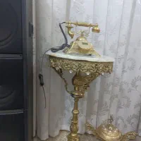 میزوتلفن برنجی سنگین میزش یک مترهست