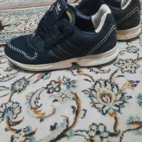 پوتین و کتونی|کیف، کفش، کمربند|بومهن, |دیوار