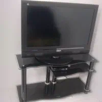 تلویزیون به همراه میز و دیجیتال