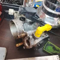 دریچه گاز پژو منیفولد اگزوز سنتر اینه