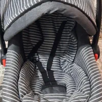 کریر و قنداق گیر نوزاد