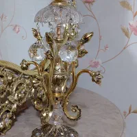 آینه و شمعدان به همراه میز برنجی