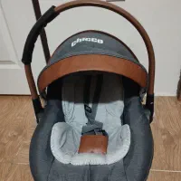 کالسکه ،کریر و تخت و آویز موزیکال نوزاد