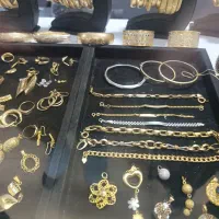 طلا بدون اجرت از 1/5تا2%