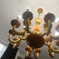 یه عدد لوستر سالم و شیک همراه با دیوار کوب