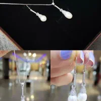 نیم‌ست و گردنبند نقره مرواریدی|بدلیجات|اصفهان, شیخ اشراق|دیوار