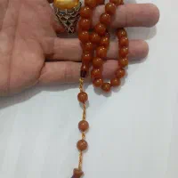 انگشتر لعل و تسبیح سندلوس