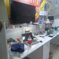 میز تعمیرات و ویترین مغازه موبایل فروشی