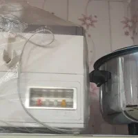 یک دستگاه پلو و عالی ویک دستگاه آبمیوه گیری ۳ کاره