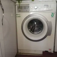 لباس شویی ابسال