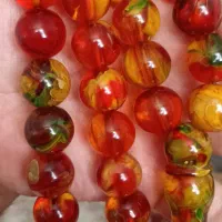 تسبیح کهربا پرچمیی ۳۳عددی دانه درشت