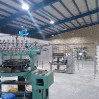 کارگر خانم  کارگاه بافندگی پارچه