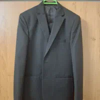 کت و شلوار قهوه‌ای