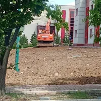 راننده بیل مکانیکی لاستیکی