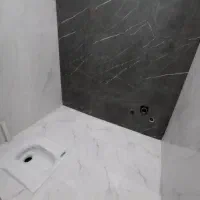 کاشی کاری و‌ سرامیک کاری وگچ کاری بازسازی ساختمان