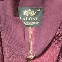 کاپشن|لباس|سبزوار, طبرسی (جعفرآباد)|دیوار