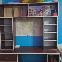 کتابخانه و میز تحریروکامپیوتر