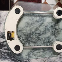 ترازو ورزشی و زیر سیگاری