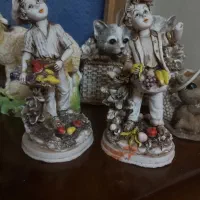 مجسمه و گلدان