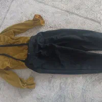 تعدادی لباس|لباس|نی‌ریز, |دیوار