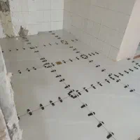نصب کشی سرامیک ما بین کابینت به صورت چسبی