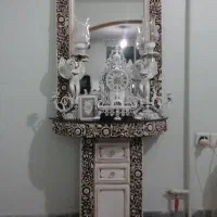 آیینه وشمدان وساعت