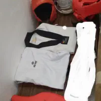 تجهیزات تکواندو با۲ کلاه ونقاب ولباس ومیت