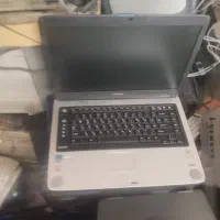 لبتاب ودربین عکاسی و فیلم برداری