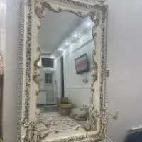 ساعت ایستاده و آیینه شمعدان