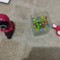 91 تیله یک عدد اسپینر و یک اسباب بازی توضیحات مهم