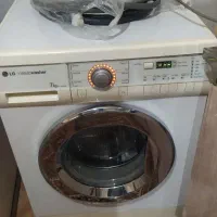 ماشین لباسشویی اتوماتیک الجی کره اصل درب استیل
