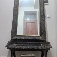 ایینه کنسول مشکی طلایی