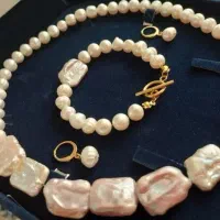 مروارید اصل باروک رنگ یاسی طبیعی .دریا خارجی درشت