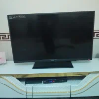 تلوزیون LED برندtcl و رادیو پخش سامسونگ