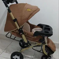 کالسکه کودک برند پویا با روکش اینتکس
