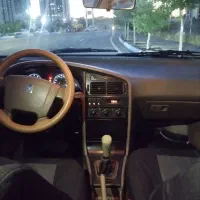 پژو 405 نقره ای دوگانه سوز کارخانه مدل 1390