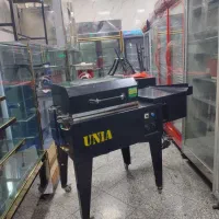 دستگاه شیرینگ پک کابینتی در حد نونو