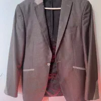 کت قهوه ای رنگ