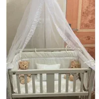 تخت کنارمادر کودک