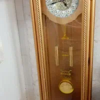 ساعت قدی طلایی