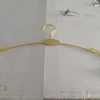 چوب لباسی طلایی