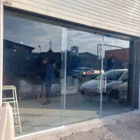 تعمیرات،جابجایی و تنظیم درب شیشه ای میرال