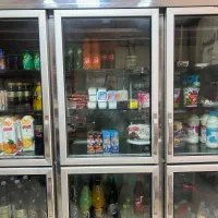 شاگرد و فروشنده مغازه سوپرمارکت