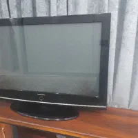 تلوزیون همراه میز تلوزیون